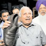 Minister Madan Mohan Mittal showing the shoe thrown by Congress MLA Tarlochan Singh Soondh towards treasury benches inside the House, at the Punjab assembly in Chandigarh on September 14 . Photo source: HT