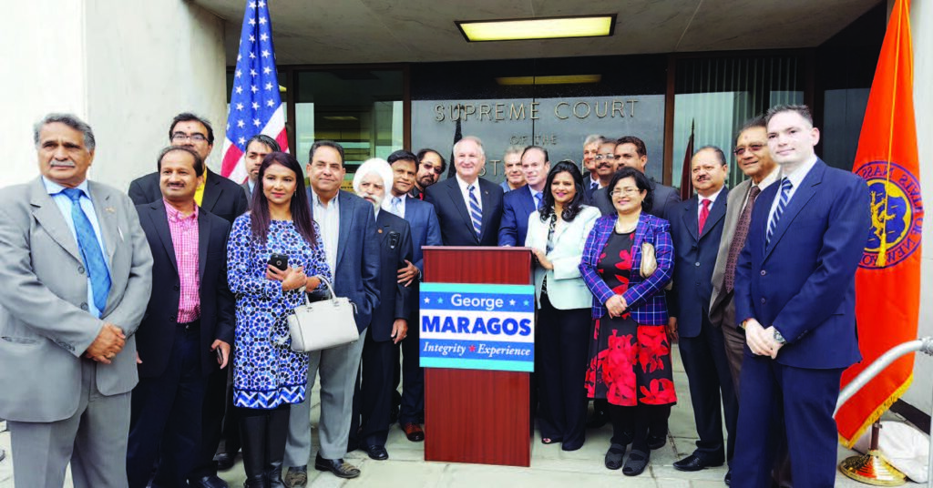 George Maragos with community leaders by his side announced to press, September 29 that he had changed his party registration to Democrat