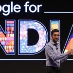Google CEO Pichai gestures as he addresses a news conference in New Delhi