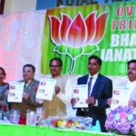 Madhya Pradesh Chief Minister Shivraj Singh Chouhan (fourth from right) releases monthly newsletter of OFBJP in Edison, NJ Photo / Courtesy Chandrakant Trivedi