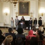 Michelle Obama with Maya Salameh, Joey Reisberg, Gopal Raman (second from r) and Maya Eashwaran (r). (AP)