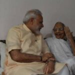 modi-takes-blessings-of-mother-on-66th-birthday