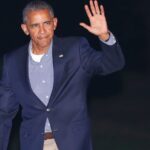 President Barack Obama waves to members of the media as he walks across the South Lawn of the White House in Washington, Friday, Sept. 9, 2016, during his return from nearby Andrews Air Force Base. Obama traveled to Asia this week and was returning from Laos after attending the ASEAN Summit. (AP Photo/Pablo Martinez Monsivais)