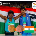 India's Mariyappan Thangavelu and Bhati Varun Singh celebrate their gold and bronze medals. AFP