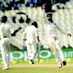 Virat Kohli and his teammates celebrating the wicket of Latham of New Zealand.