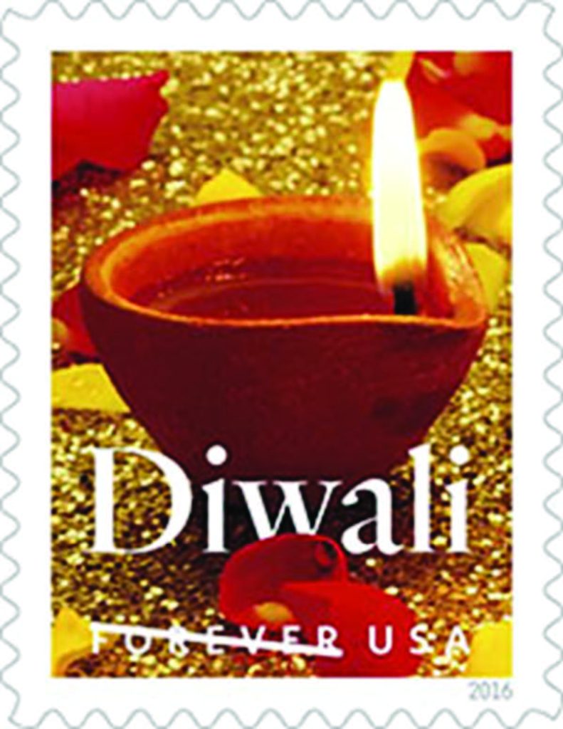 The goodness, the purity, the beauty of Diwali diya were so beautifully woven together with lustrous colors in the Diwali Stamp USPS unveiled, October 5, in the presence of exultant Indian American community, politicians, lawmakers, officials, media and the USPS staff at the Indian Consulate in New York. The gorgeous stamp is the result of the imagination and artistic touch of a triumvirate. The diya was photographed by Sally Anderson Bruce of New Milford, CT. The stamp was designed by Greg Breeding of Charlottesville, VA. And William J. Gicker of Washington DC was the Art Director of the Project Diwali Stamp. Photos/ Mohammed Jaffer-SnapsIndia
