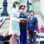 Nikki Haley in January 2015 being sworn into her second term as governor by Chief Justice Jean H. Toal, while her husbandMichael, center, and their son, Naline, watched.  Photo Credit Richard Shiro/Associated Press