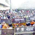 People line up outside State Bank of India to deposit and exchange banned currency notes for new ones at Gandhi Nagar in New Delhi.