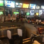 Can a Racialist regime break the bond? Photo caption: A multiracial, multicultural group of Americans at No Frills Grill & Sports Bar in Fort Worth, Texas , February 3, 2017