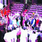 Members protest in the well of the Rajya Sabha in New Delhi on Thursday, Feb 9. Photo courtesy PTI