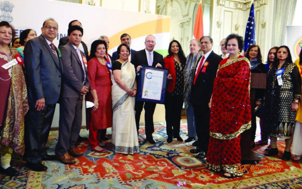 The Executive Committee members with New York City Comptroller Scott Stringer (holding a commendation)