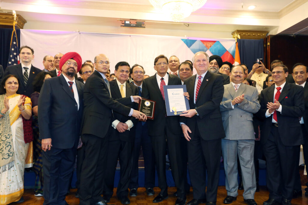 Dr. Manoj Kumar Mohapatra , the Deputy Consul General of India in New York has always been a very welcome guest at community events. One of the latest events where he met with community representative, on March 4, was the inauguration of Prof. Indrajit Singh Saluja, Editor-Publisher of The Indian Panorama, as President of Indo-American Press Club and the felicitation of Mr. HR Shah, Chairman and CEO of TV Asia on conferment on him of one of India’s highest civilian awards, Padma Shri. In the picture, he is seen presenting a plaque to Mr. HR Shah, while the Nassau County Comptroller Mr. George Maragos (right) presented a Nassau County Citation. Also seen from L to R: Purnima Desai, Dilip Chauhan, Jehangir Khattak, Lal Motwani, Prof. Saluja, Dr. VK Raju, Dr. Sudhir Parikh, Dr. D Nori, Srujal Parikh, Rajiv Bhambri, Mohinder Taneja, Dr. Ajay Lodha, Gobind Munjal, Dr. Bhupi Patel Photo/Mohammed Jaffer-SnapsIndia