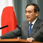 Japan’s Chief Cabinet Secretary Yoshihide Suga speaks to media during a news conference after the reports on the launch of a North Korean missile in Tokyo, Japan