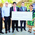 Dr. Kiran Patel and wife Dr. Pallavi Patel present a donation of $5 million to Florida Hospital Carrollwood