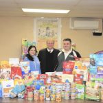 From left to right: Dr. Jessica Rosati, Chief Program Officer; Nassau County Executive Edward P. Mangano; and Billy Gonyou, Manager of the LI Cares February Food Drive