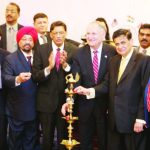 Lighting the lamp to inaugurate the event. From L to R: Purnima Desai, Rajiv Bhambri, Vandana Sharma, Sudhir Vaishnav, Dr. VK Raju,, Peter Kothari, Dr. D. Nori, Biju Chacko, Prof. Indrajit S Saluja, Parveen Chopra, HR Shah, George Maragos, MC Sangeet Sharma (partially visible), Dr. Sudhir Parikh, Ginsmon Zacharia (partially visible) , Srujal Parikh Photo/ Mohammad Jaffer-SnapsIndia