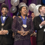 Indrani Das, 17, of Oradell, New Jersey, wins top prize and $250,000 in Regeneron Science Talent Search. Also pictured are Aaron Yeiser (left), 18, of Pennsylvania, who won 2nd Place and $175,000, and Arjun Ramani (right), 18, of Indiana, who won 3rd Place and $150,000. Photo Credit: Society for Science & the Public
