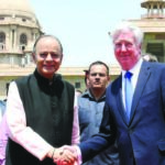 Defence Minister Arun Jaitley shakes hands with UK Defence Secretary Michael Fallon in New Delhi on April 13.