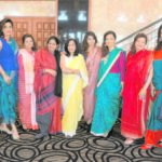 RTA Kapur Chishti and Madhoolica Dear President of Indo-American Heritage Museum with Women from the community modeled saris draped in various regional styles