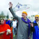 B.C. NDP Leader John Horgan waves to supporters at the Vaisakhi celebrations. Photo Courtesy:JASON PAYNE / PNG