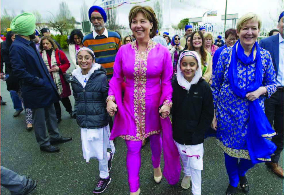 Christy Clark joins the tens of thousands of Vaisakhi revellers. Photo Courtesy:JASON PAYNE / PNG