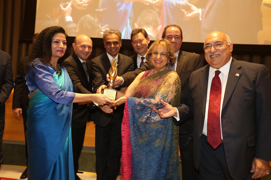 P 1 Lakshmi Puri receives her award