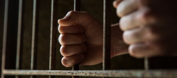 Behind-bars-590×260