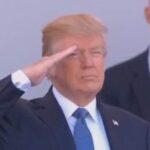 Trump taking salute