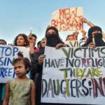 Indian Americans protest outside Indian Embassy in Washington to demand justice for rape victims in India