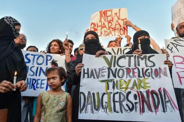 Indian Americans protest outside Indian Embassy in Washington to demand justice for rape victims in India