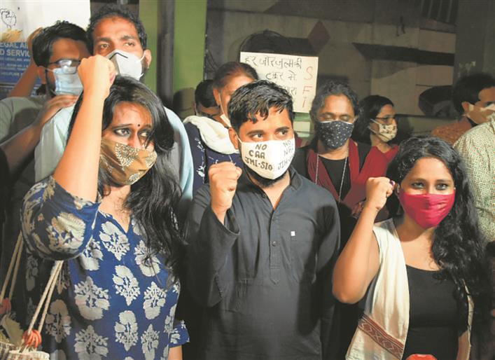 Natasha Narwal, Asif Iqbal Tanha and Devangana Kalita outside Tihar Jail in Delhi after their release on June 17, 2021.