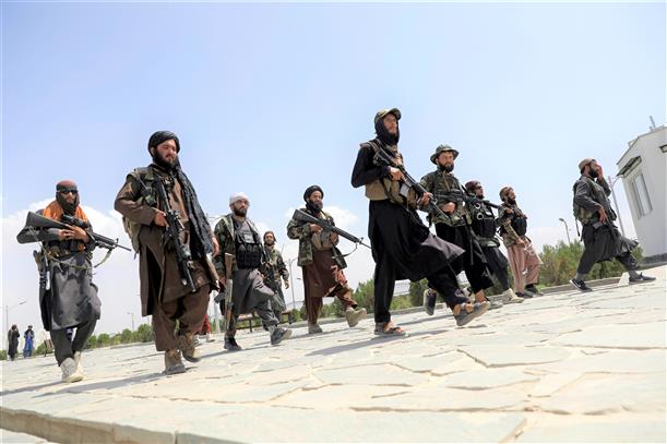 Taliban fighters patrol Kabul streets