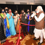Modi acknowledging greetings