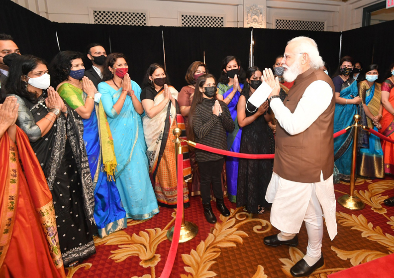 Modi acknowledging greetings