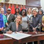 Curran signs bill