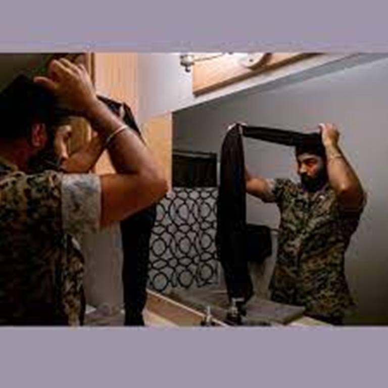 Sikh-American officer allowed to wear a turban with limitations He May Sue- Report
