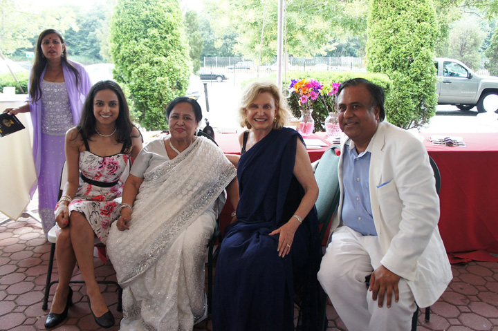 Uma Sengupta and family with Congresswoman Carolyn Malony