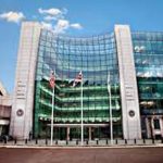 Indian Americans charged with insider trading