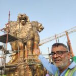 Laxman Vyas with newly sculpted National Emblem at new parliament building