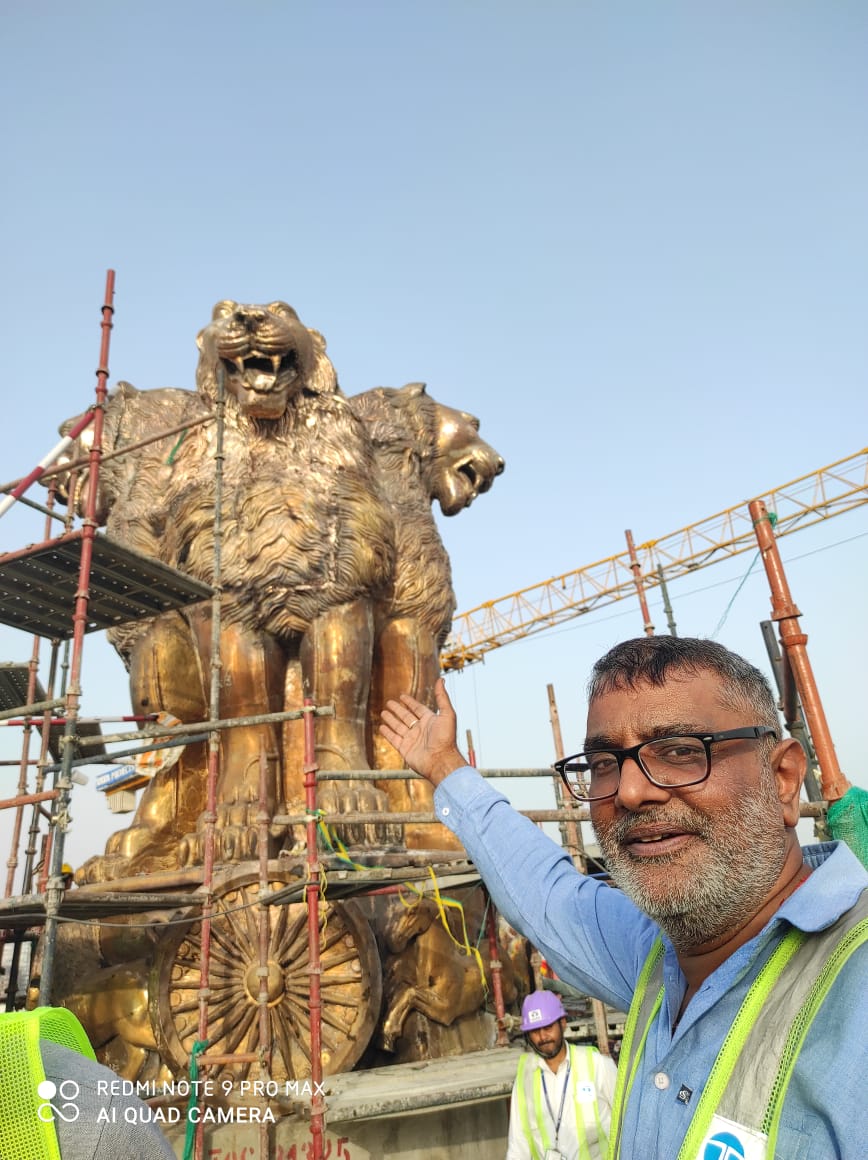 Laxman Vyas with newly sculpted National Emblem at new parliament building