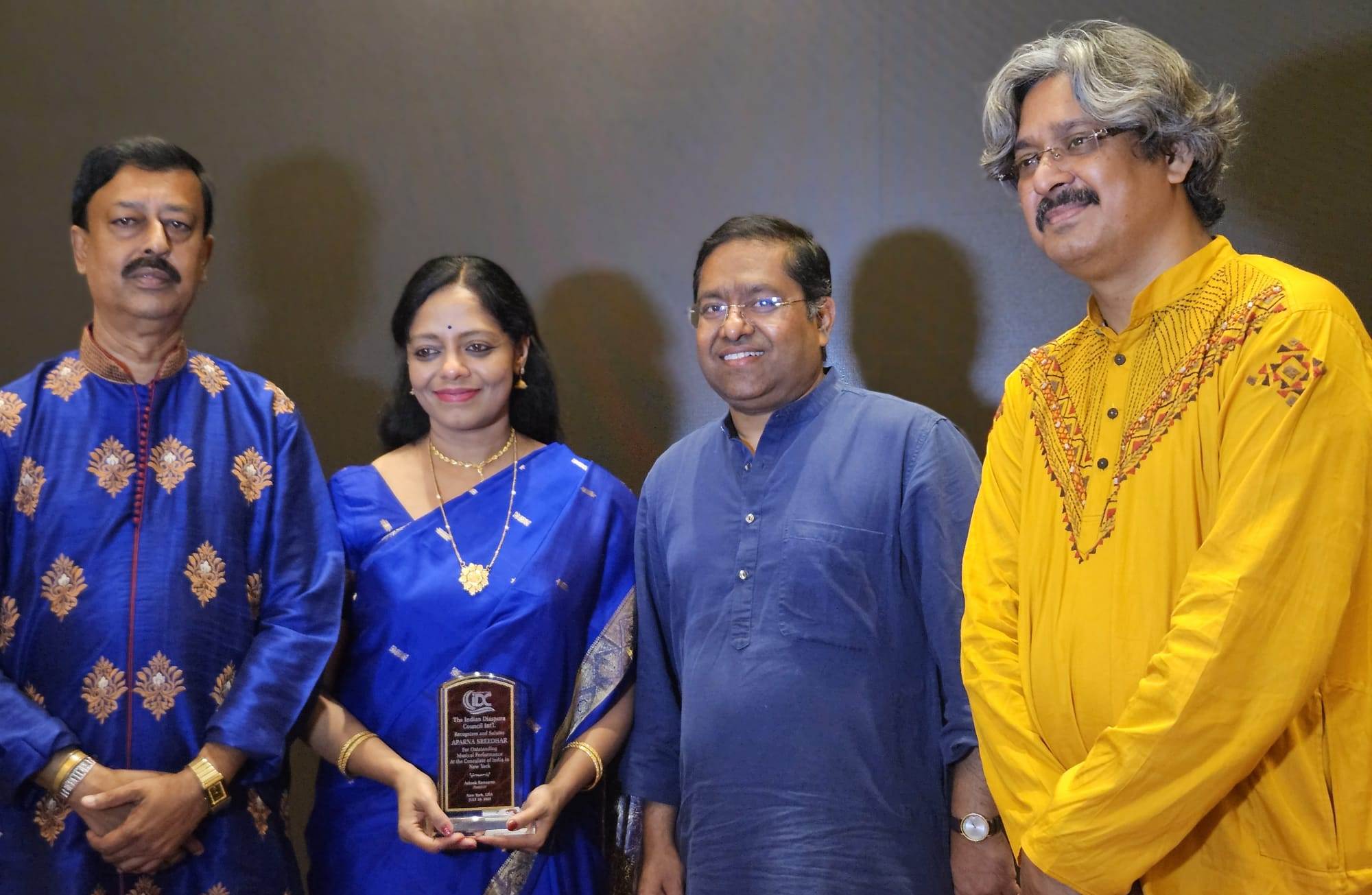 Performers Robi Bhattacharya, Aparna Sreedhar and Biplab Mukherjee with the Consul General Randhir Kumar Jaiswal.