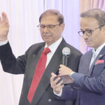 Consul General of India in New York Mr. Binaya Srikanta Pradhan administers the oath of office to Gobind Munjal as President of the national Executive Committee of the Association of Indians in America